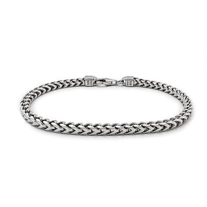 silver bracelet for women with 4mm franco links on a white surface
