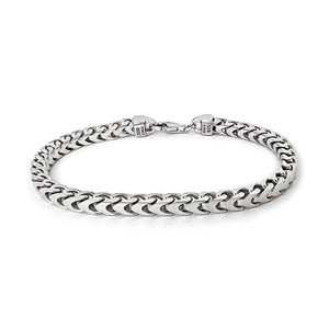 a sterling silver bracelet for men with 5mm franco links rests on a white surface