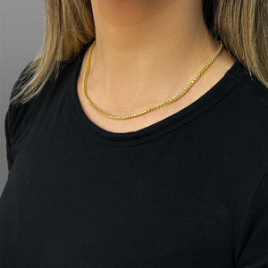 womens gold chain on a girl's neck. The necklace is a 3mm franco chain in 14k gold