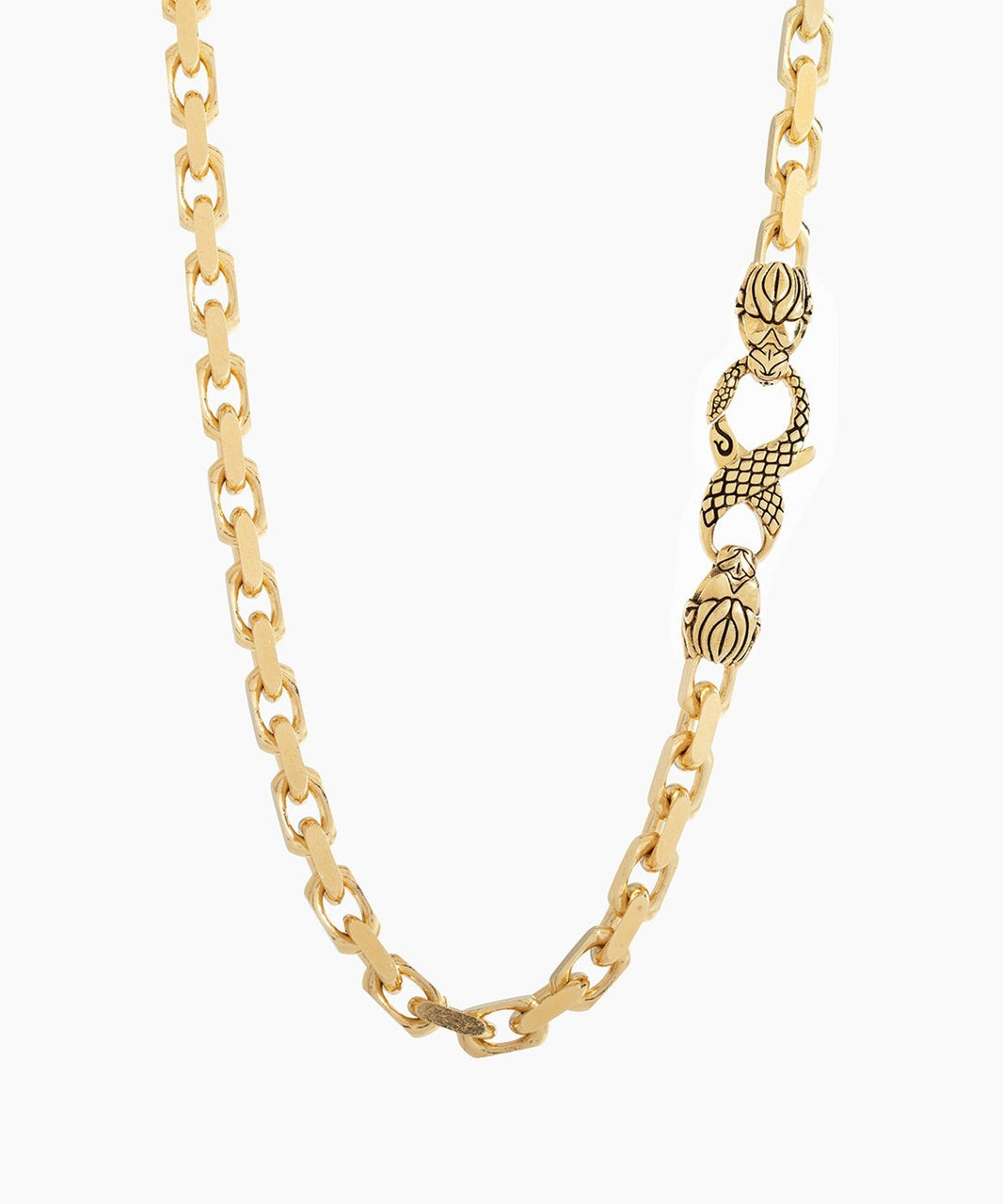 Gold Franco, Cuban and link chains laid side by side on a black mat