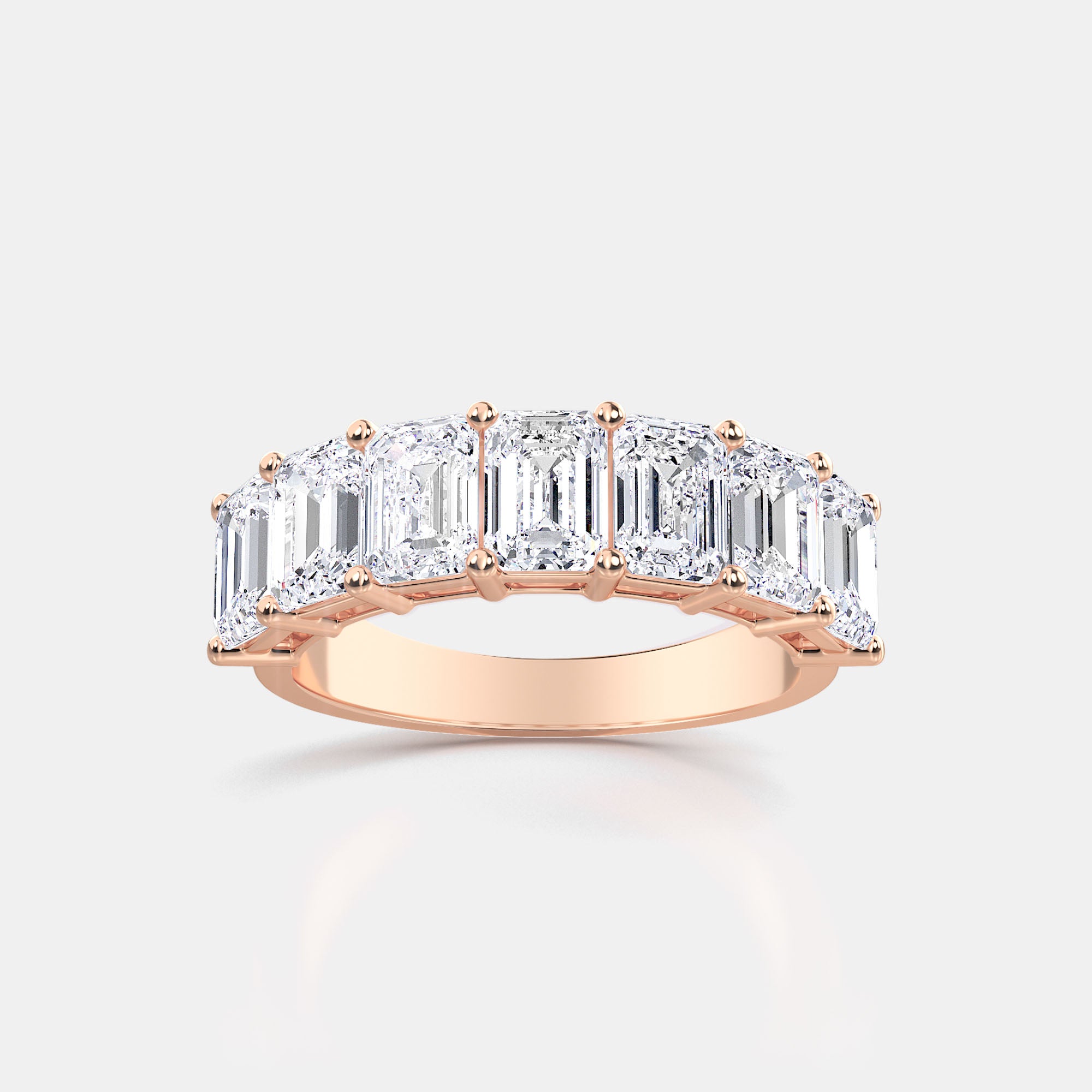 EMERALD CUT 7-STONE RING