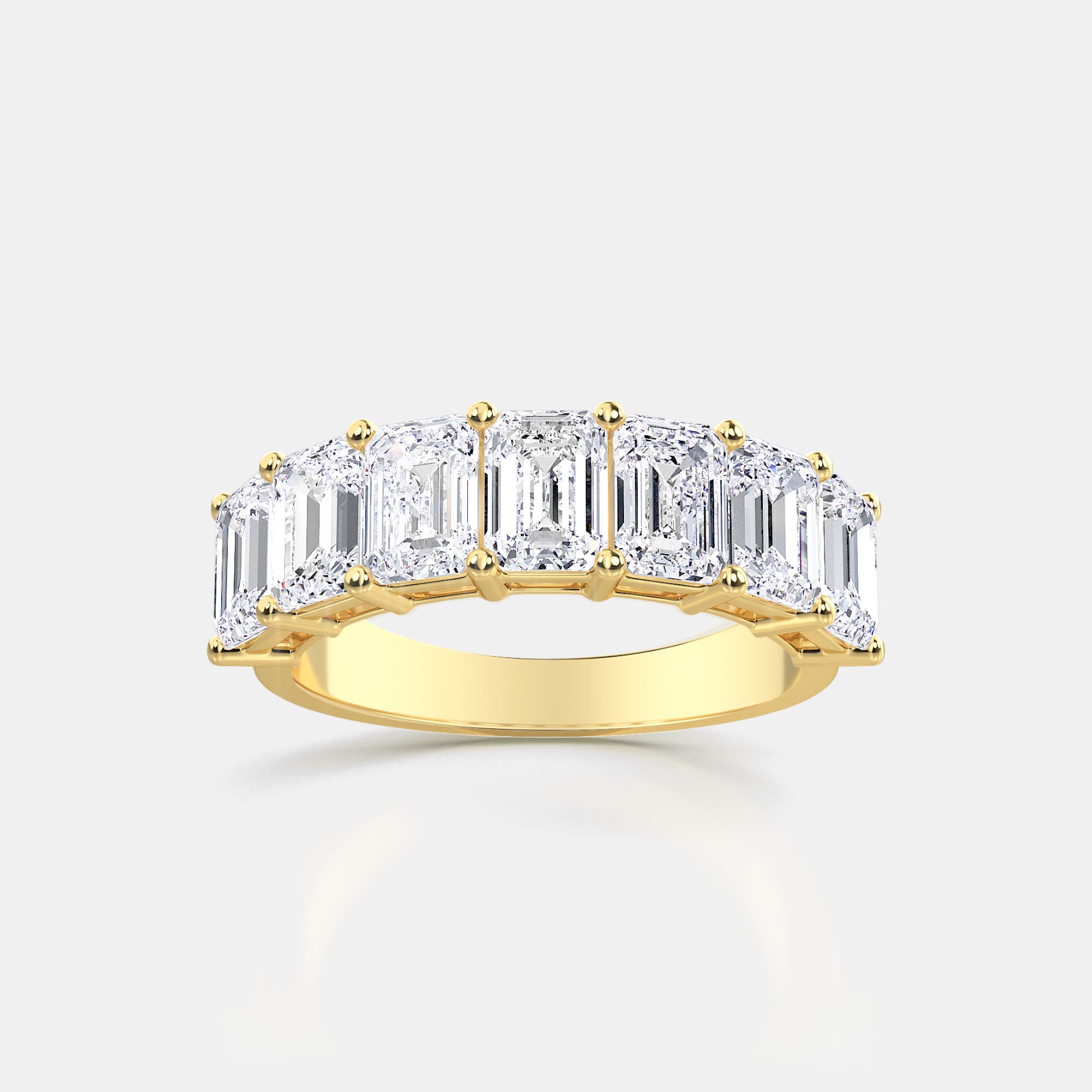 EMERALD CUT 7-STONE RING