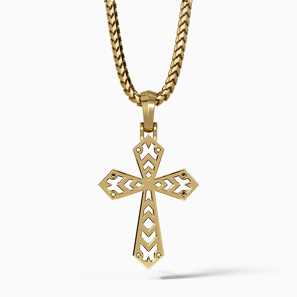 a modern mens gold cross necklace hangs from a chain