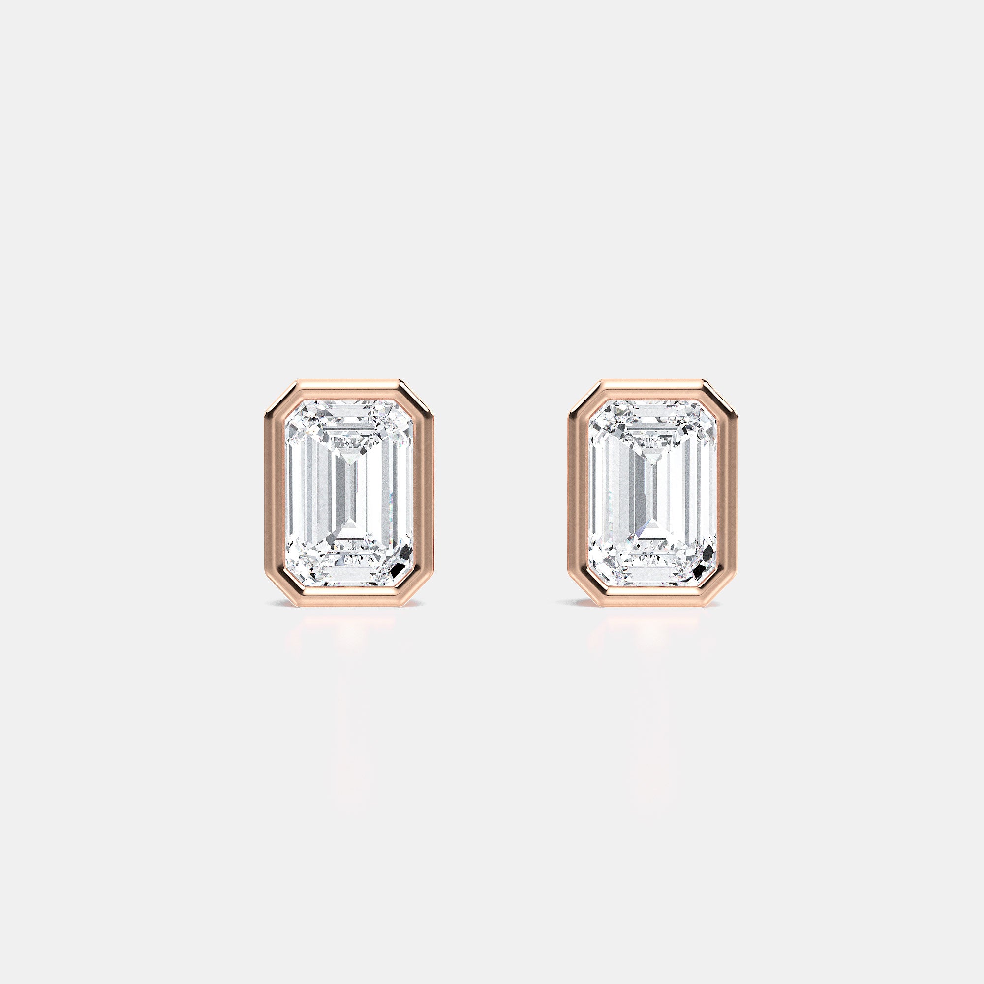EMERALD BEZEL STUDS