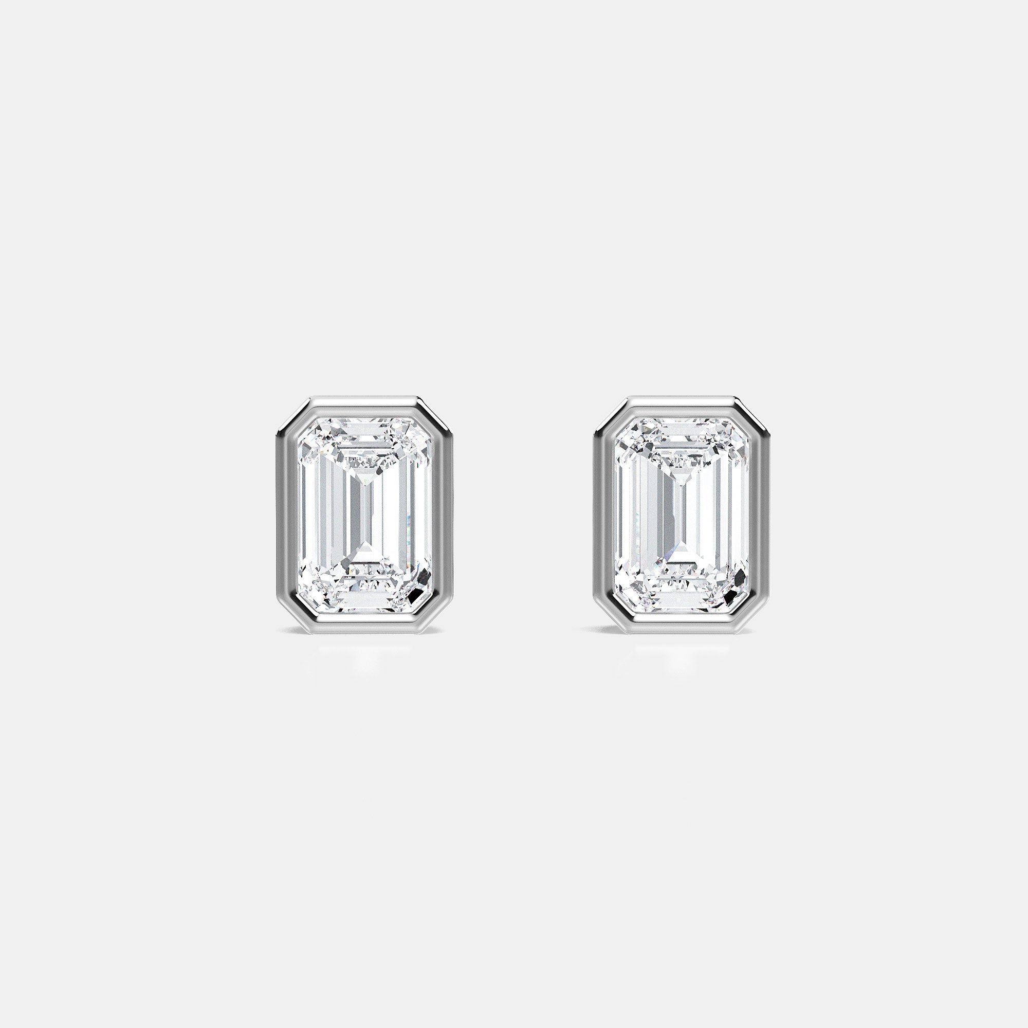 EMERALD BEZEL STUDS