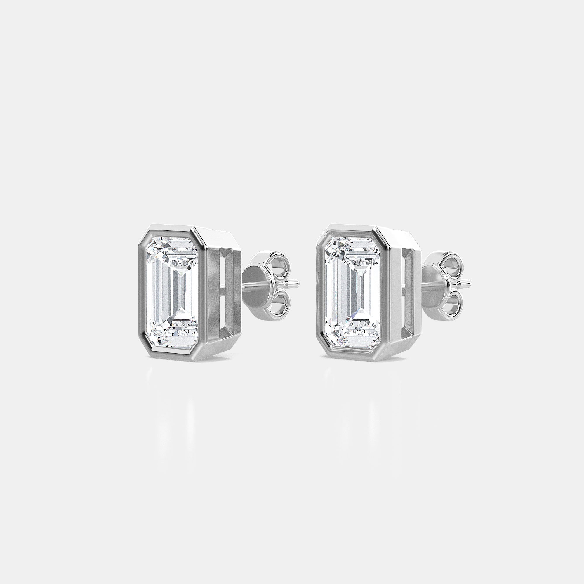 EMERALD BEZEL STUDS