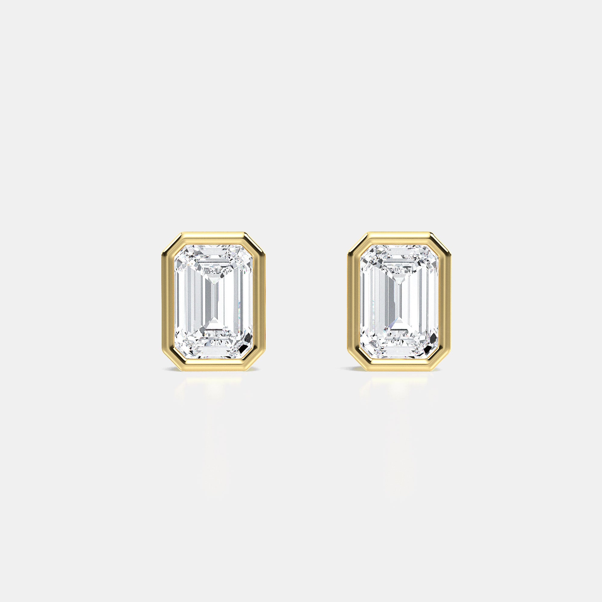 EMERALD BEZEL STUDS