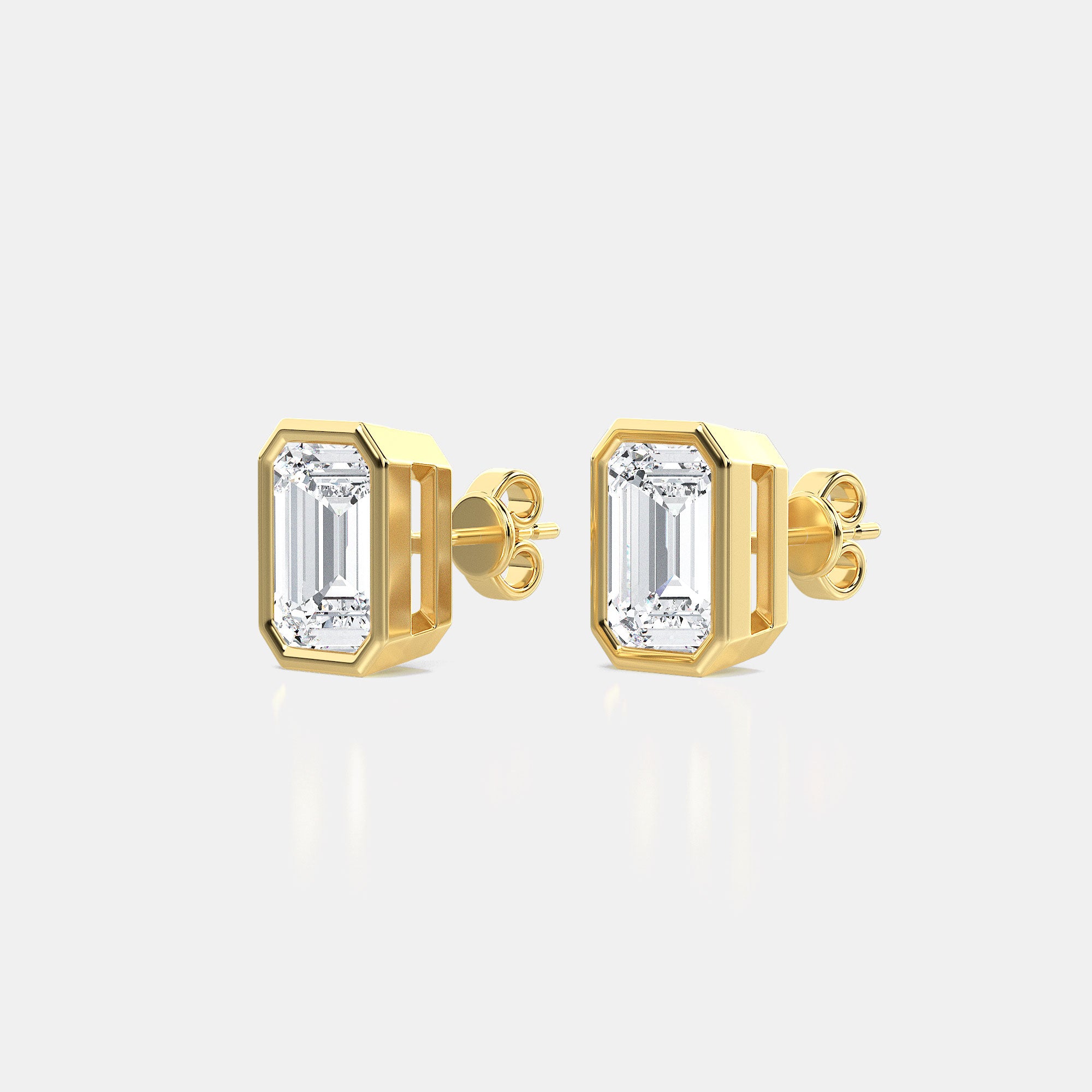 EMERALD BEZEL STUDS