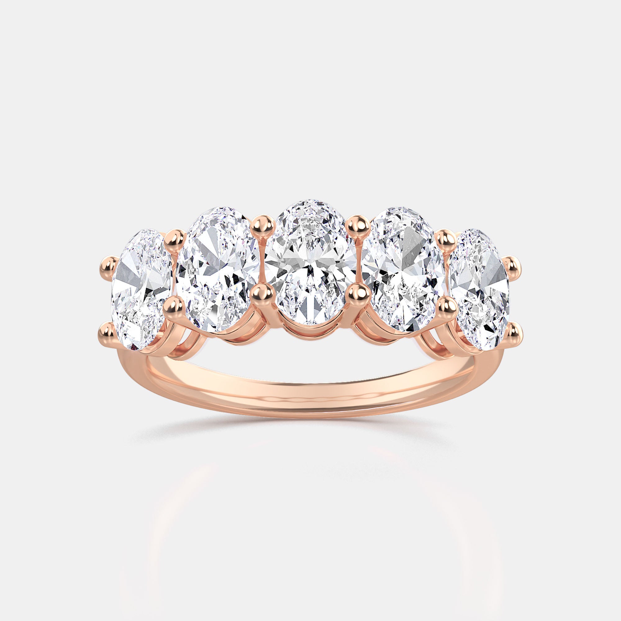 OVAL 5-STONE RING