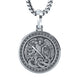 A silver-toned round pendant necklace featuring an embossed relief of Saint Michael with wings and a sword fighting a serpent, suspended from a thick curb chain against a plain white background.