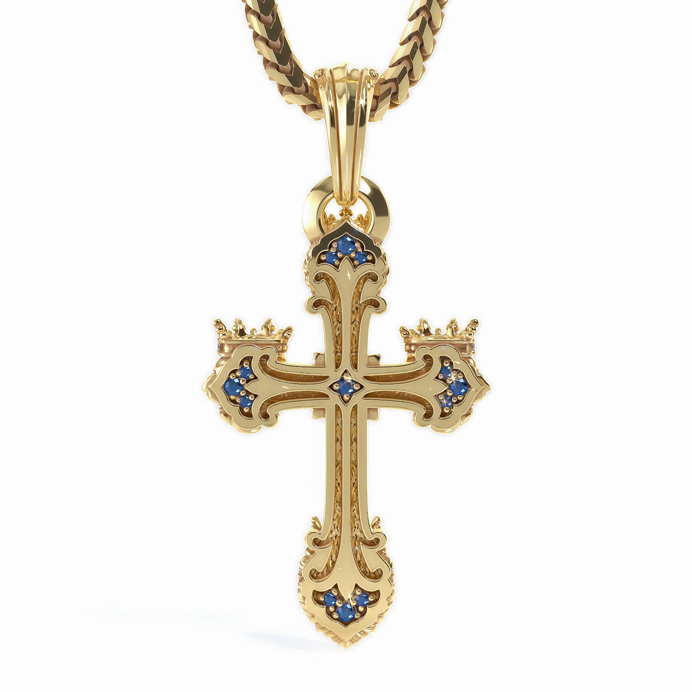A gold cross pendant necklace with ornate baroque-style detailing and small blue gemstone accents, shown on a white background.