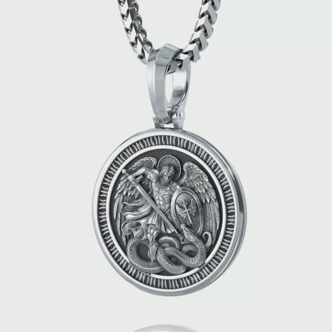 Saint Michael the Archangel silver pendant necklace design showcasing Saint Michael defeating Satan the serpent