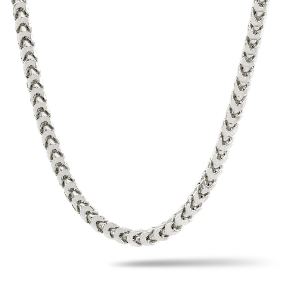 a 5mm silver franco chain hanging over a white surface