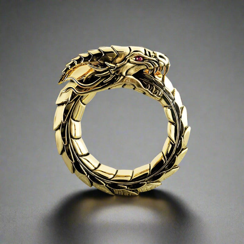 Gold dragon ring with ruby eyes