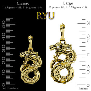 a small and large dragon pendant are shown on a ruler for size scale
