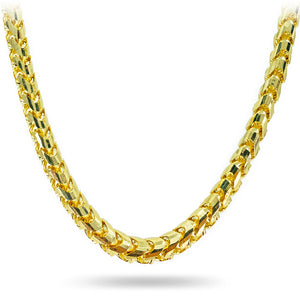 closeup of a 14 karat yellow gold 7mm diamond cut franco chain