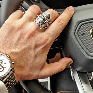 skull ring with diamonds in a Lamborghini