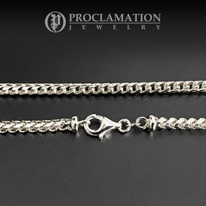 the lobster clasp of an Italian white gold franco chain