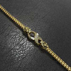 a gold franco chain with the lion and snake clasp by Proclamation Jewelry