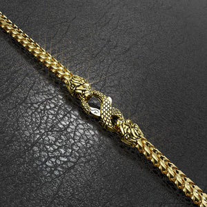 a gold franco chain with the lion and snake clasp by Proclamation Jewelry
