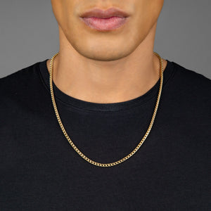 a man in a black t shirt wearing a 3mm diamond cut franco gold necklace for men