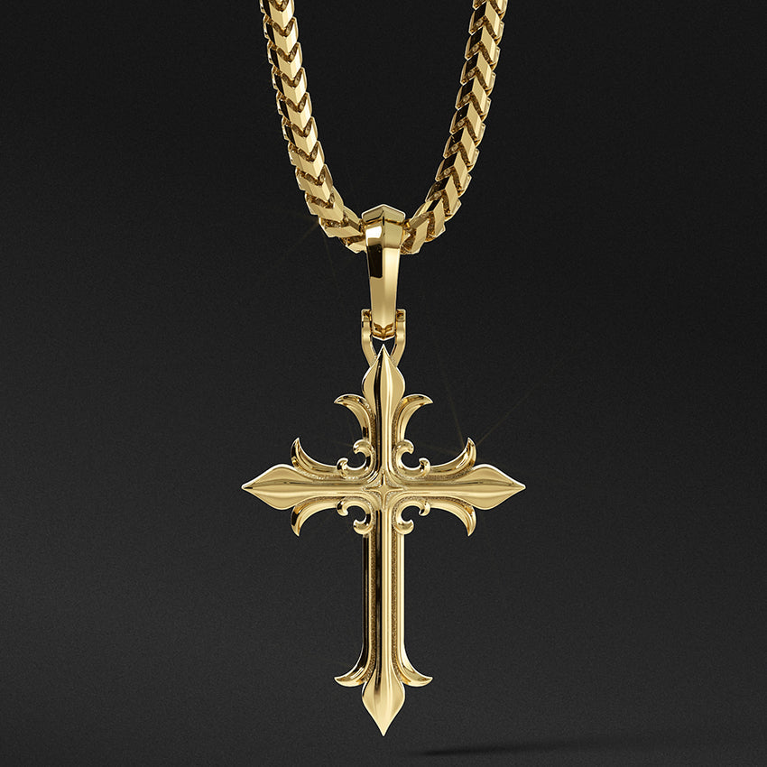 a mens gold cross necklace hangs from a chain