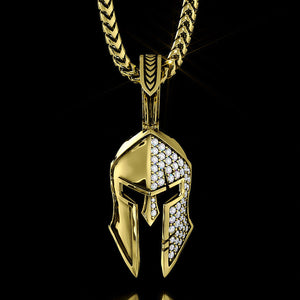 a gold Spartan pendant with half of the helmet covered in diamonds
