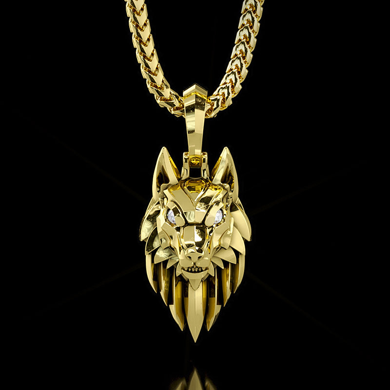 a sleek gold wolf pendant with diamond eyeshangs from a franco chain