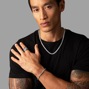 man in a studio wearing a beautiful 5mm franco chain and the matching silver bracelet