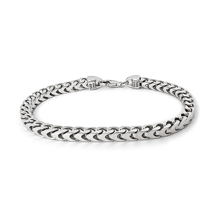 a 5mm silver franco bracelet for men lies on a white surface